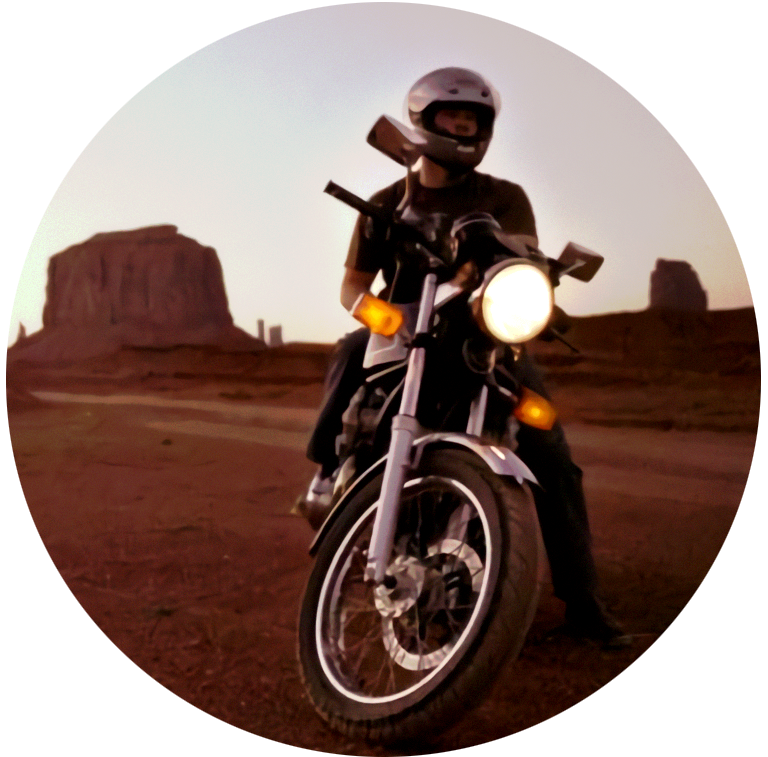 Lonely Road rider on motorcycle in Monument Valley